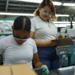 Fenix workers operating industrial machinery