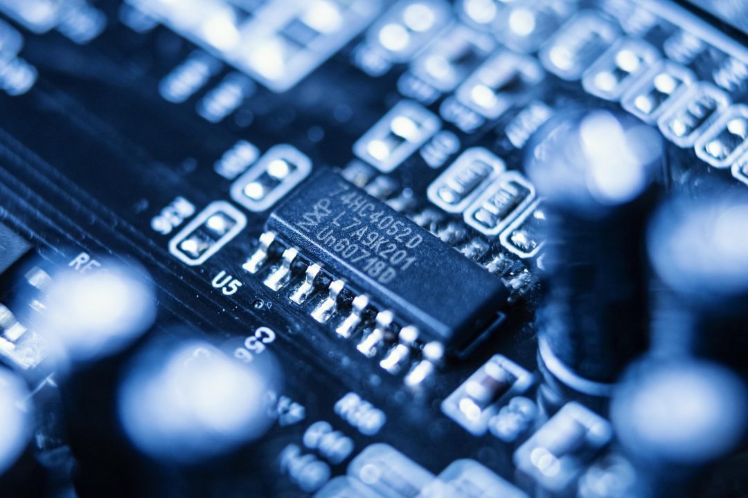 Detailed view of a modern printed circuit board with surface mount technology.