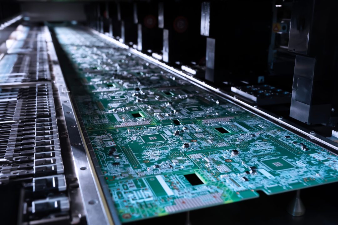 Conveyor belt showcasing efficient electronic assembly for mass production.