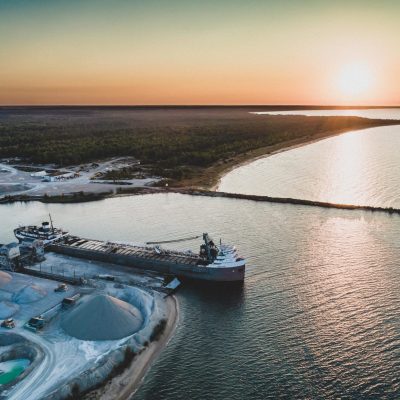 A cargo ship at a Dominican Republic port, highlighting the country's growing role in global trade.