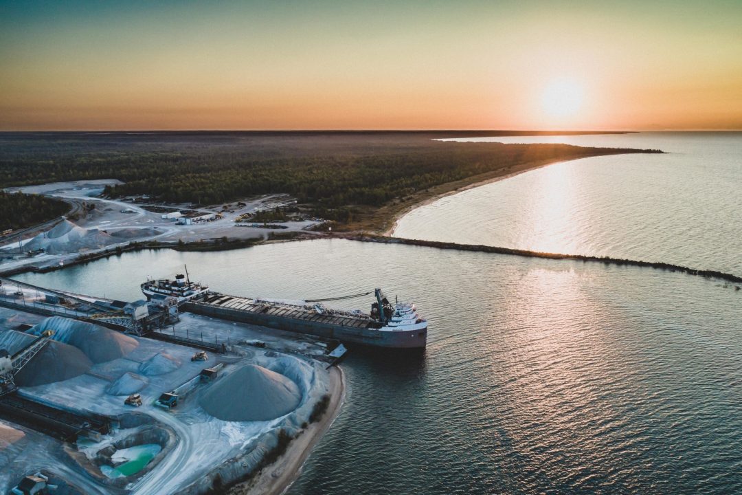 A cargo ship at a Dominican Republic port, highlighting the country's growing role in global trade.