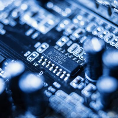 Detailed view of a modern printed circuit board with surface mount technology.
